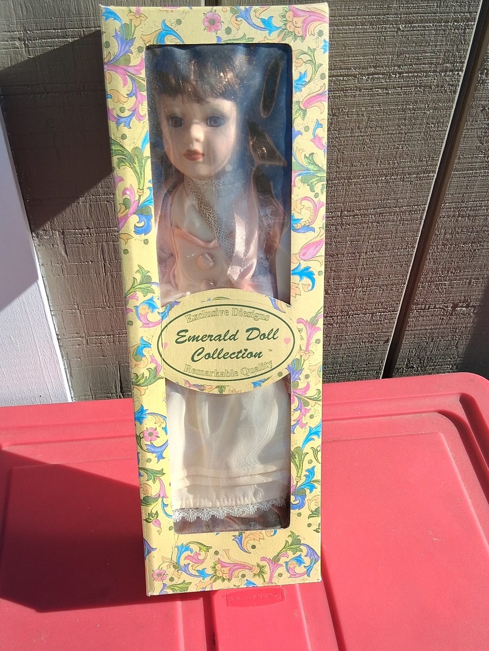 Emerald Doll Collection Porcelain Doll in Pink and Cream Outfit